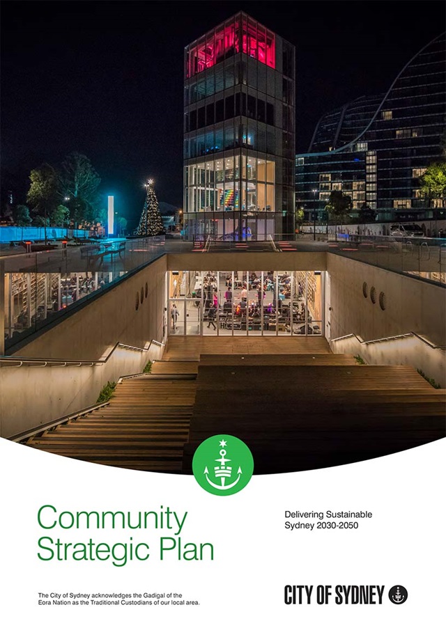 Cover page of the document, showing an illuminated building at night time.