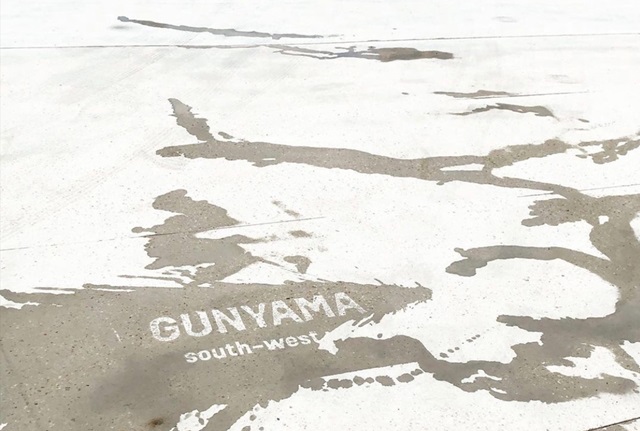 Splashed water on concrete reveals local Aboriginal words Gunyama south- west