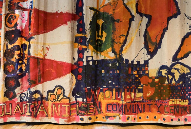 A curtain with a painting on it. A curtain with a painting on it.