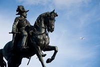 Bronze statue of King Edward VII in uniform on horseback.