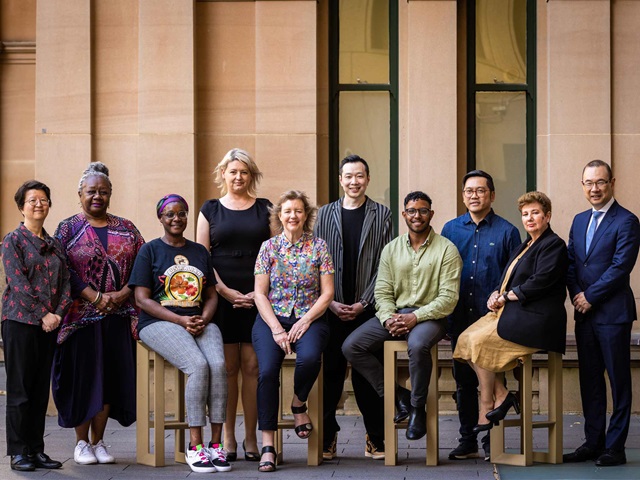 Members of the Multicultural Advisory Panel pose for a group photo at Sydney Town Hall