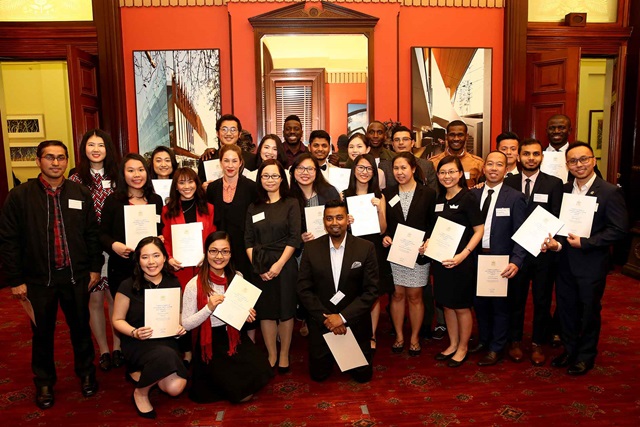 Students in the program with their certificates.