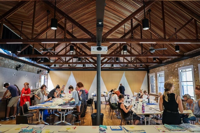 Volunteers at a community sewing bee in January 2020.