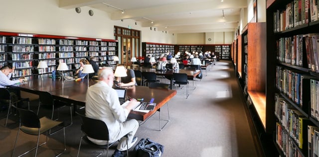 People seated in the study area at Customs House library.