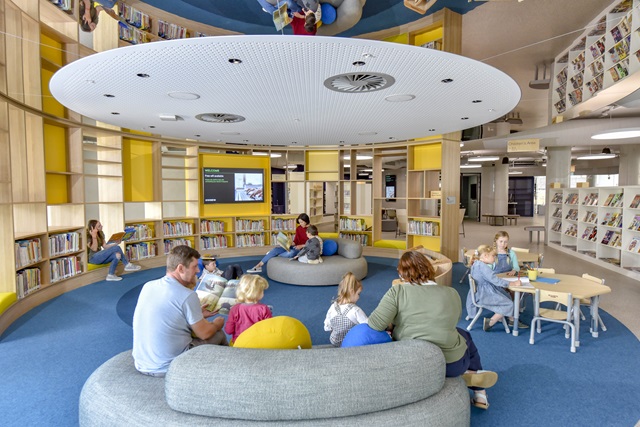 Families enjoy children's reading area at Darling Square library.