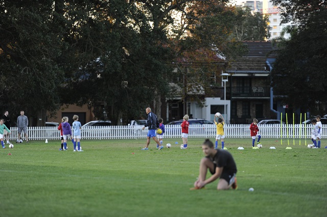 Young children pictured at soccer training in Alexandria park.