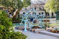 Bubbler and play equipment at Nita McCrae Park.