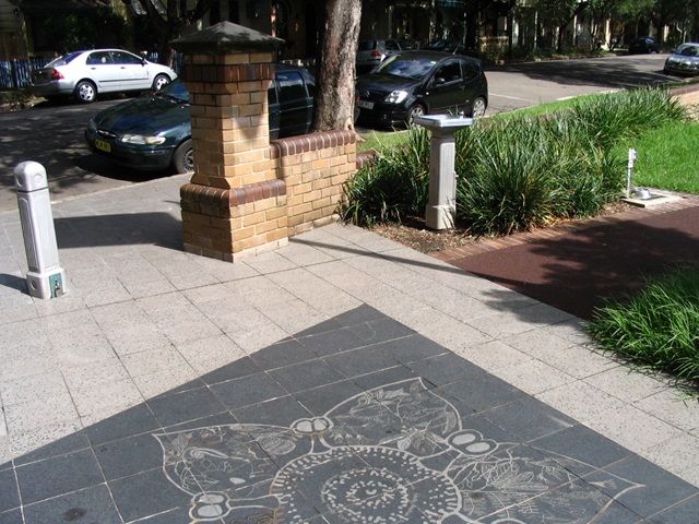 Patterned tiles at the entrance of Solander Park.