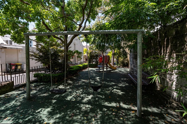A swing set in a playground.