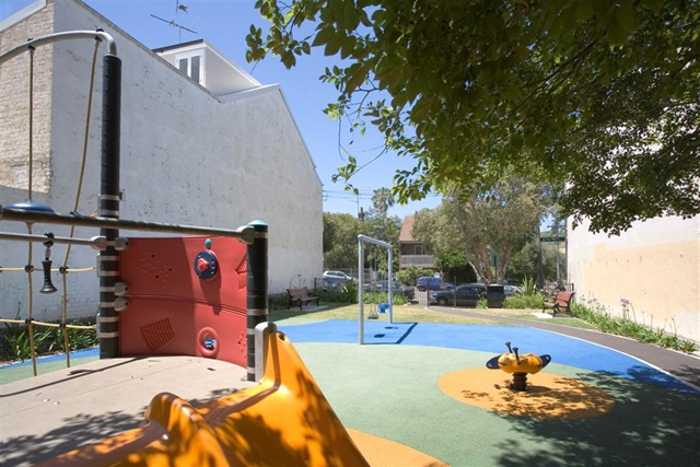 View from within the May Pitt playground at the children's slide