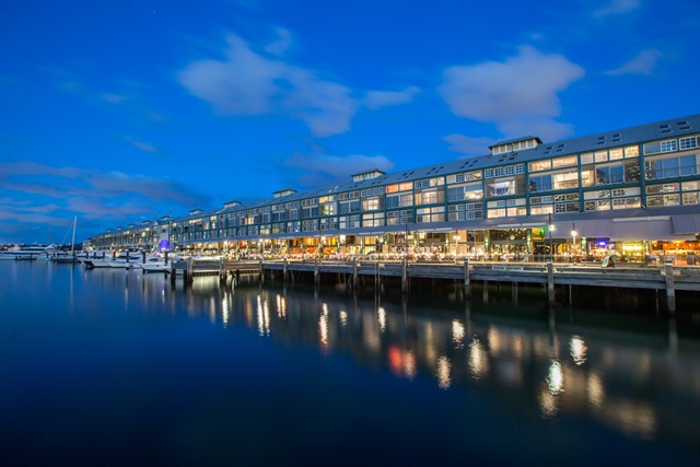 Sydney's Finger Wharf lit up