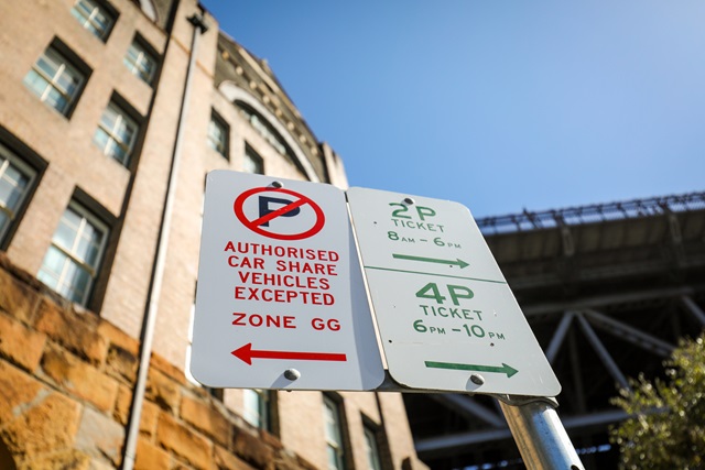 A carsharing street sign