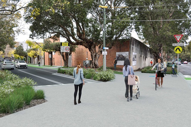 A photomontage of the proposed raised crossing showing a person walking, a person pushing a pram and a person walking a bike across Belmont Street.