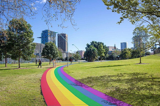 Artist impression of a rainbow pathway through a park