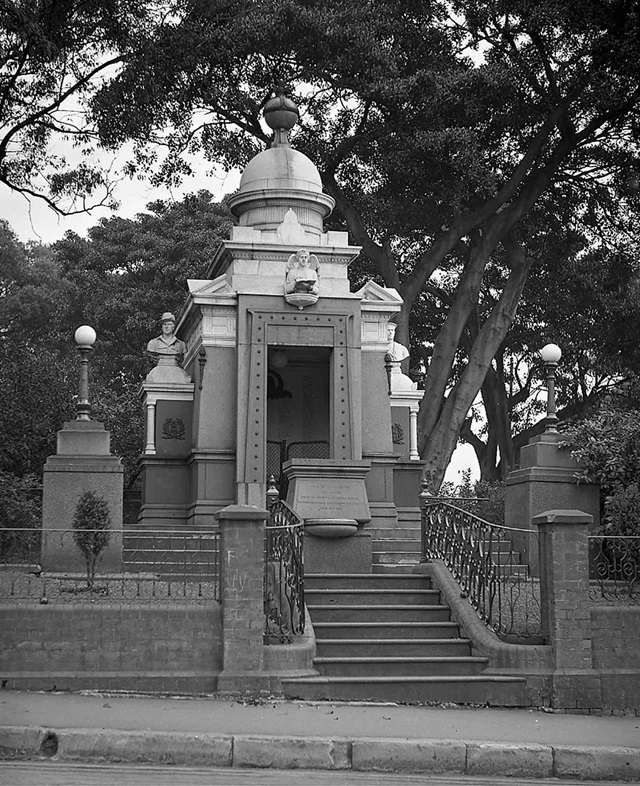 An historic photo of steps leading to a building.