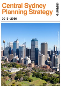 Document cover with an aerial view of a city with tall buildings. A large green park with trees and smaller buildings is in the foreground.