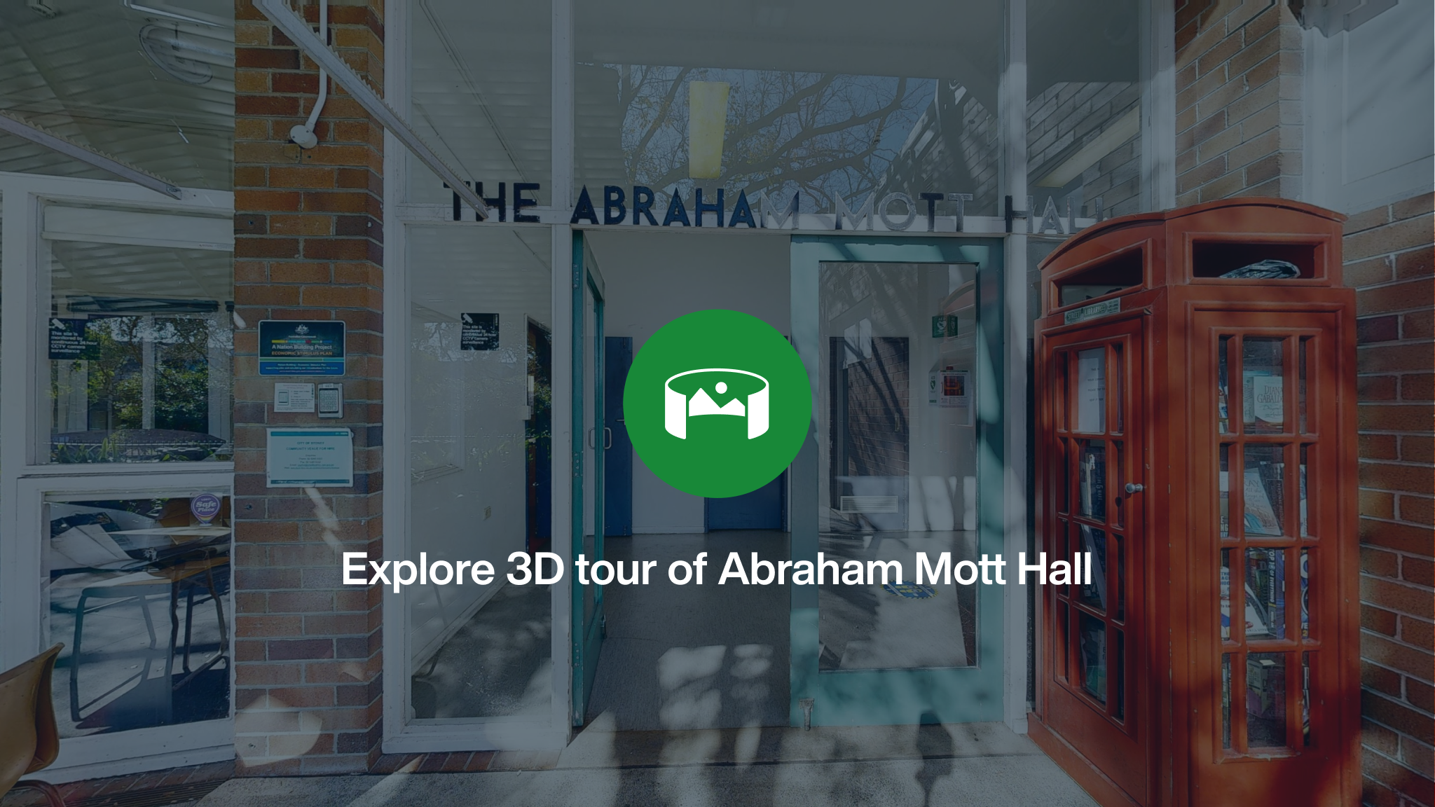 The front entrance to Abraham Mott Hall overlayed with a green icon and the words Explore 3D tour of Abraham Mott Hall.