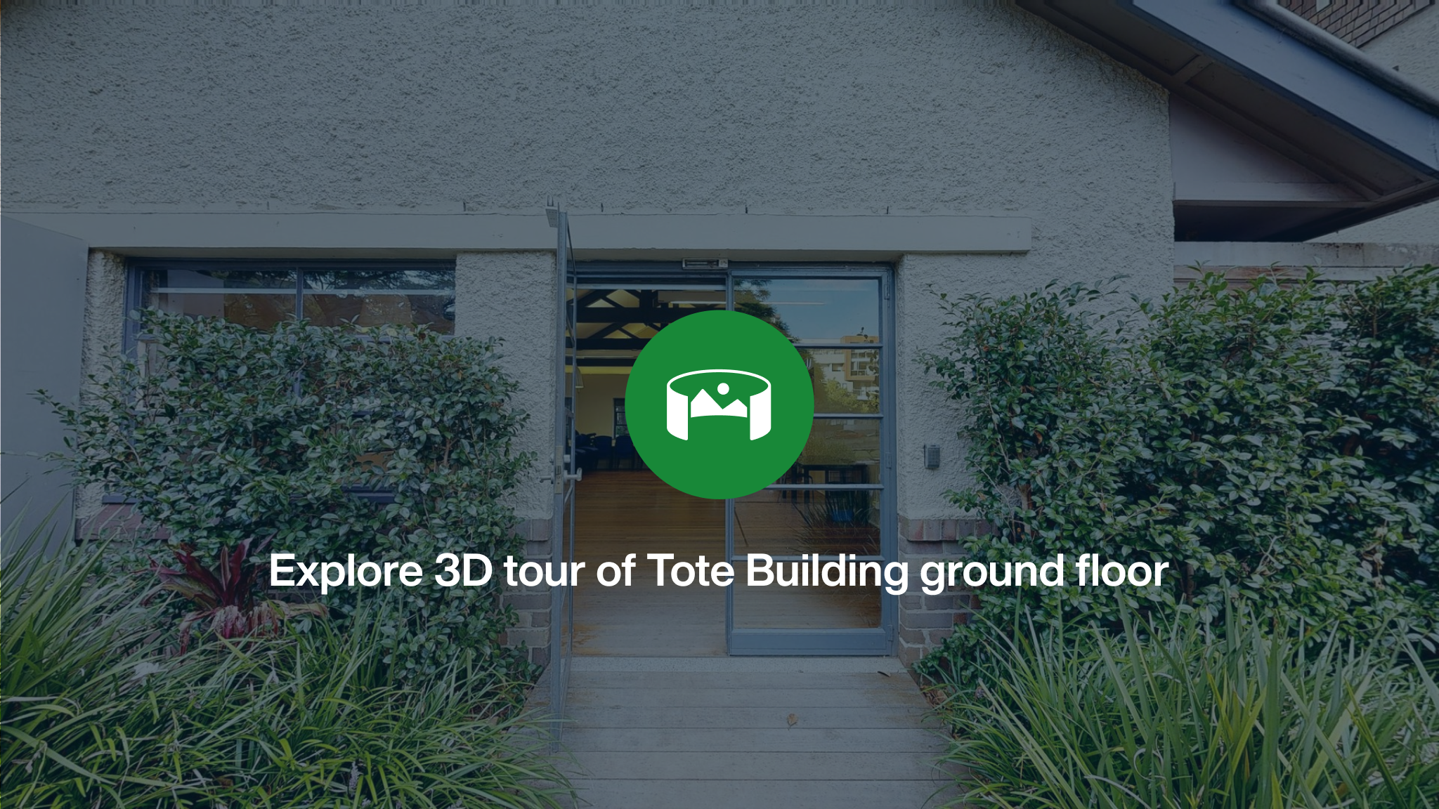 The front entrance to Tote Building overlayed with a green icon and the words Explore 3D tour of Tote Building.
