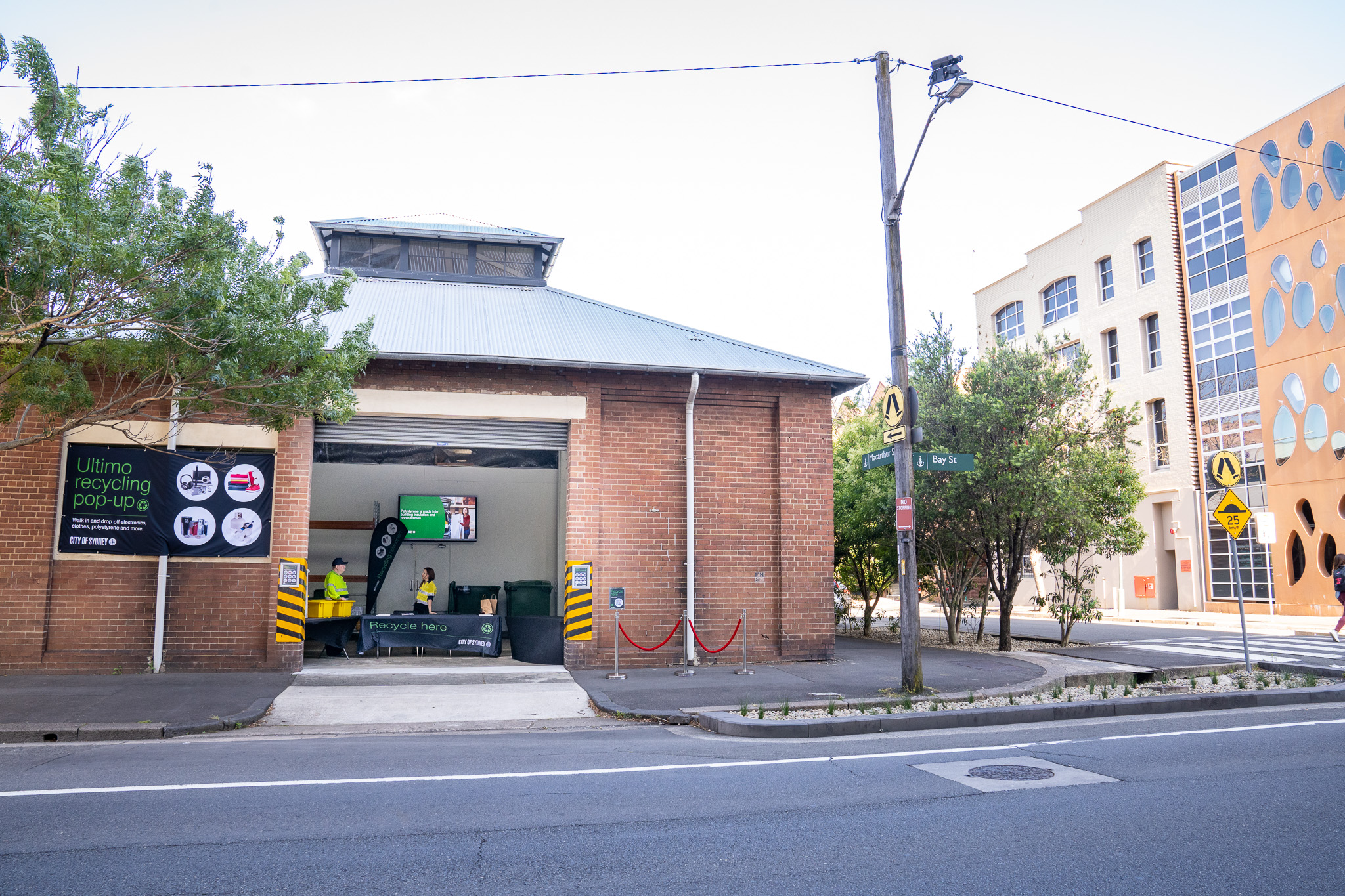 Corner building with garage door open