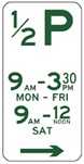 A parking sign indicating that this area is half-hour parking between 9:30am to 3:30pm on Monday to Friday, and between 9am to 12 noon on Saturday.