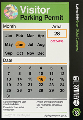 A visitor parking permit, with a box for the month, a box for the date and an area code of 28. The month of June and the date of the 16th are scratched off, showing the chosen day of use for this permit as 16 June.